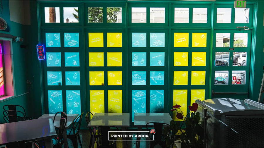 Printed window graphics on a restaurant storefront